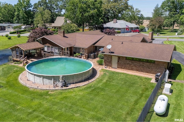 415 E Reichert Dr, Marion, IL 62959 - outdoor pool featuring a yard