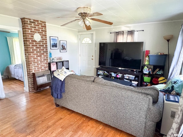 135 Walnut St, Alto Pass, IL 62905 - living room featuring ornamental molding, wood finished floors, ceiling fan, and healthy amount of natural light