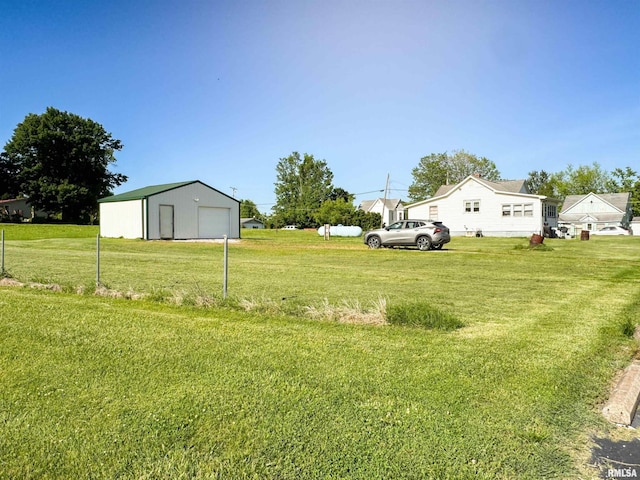 135 Walnut St, Alto Pass, IL 62905 - view of green lawn with a garage and an outdoor structure
