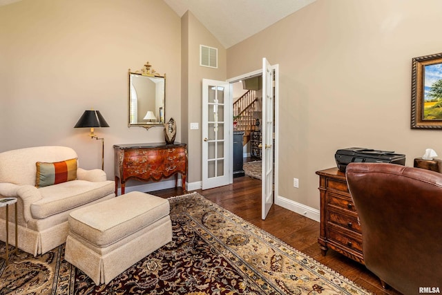 1302 Collins Ln, Marion, IL 62959 - home office with vaulted ceiling, baseboards, wood finished floors, and french doors