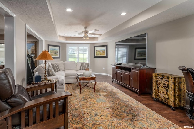 1302 Collins Ln, Marion, IL 62959 - living area featuring ceiling fan, dark wood finished floors, baseboards, a tray ceiling, and recessed lighting