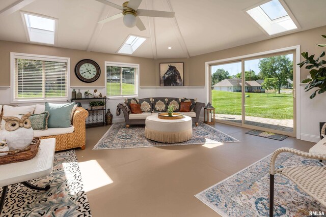1302 Collins Ln, Marion, IL 62959 - living area featuring a skylight, ceiling fan, lofted ceiling, and healthy amount of natural light