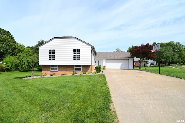 3100 Mulberry Ave, Mount Vernon, IL 62864 - tri-level home with brick siding, a front lawn, concrete driveway, and a garage