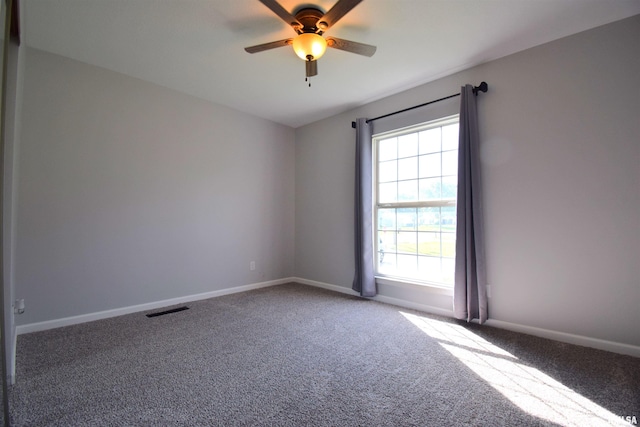 3100 Mulberry Ave, Mount Vernon, IL 62864 - empty room with healthy amount of natural light, carpet, and ceiling fan