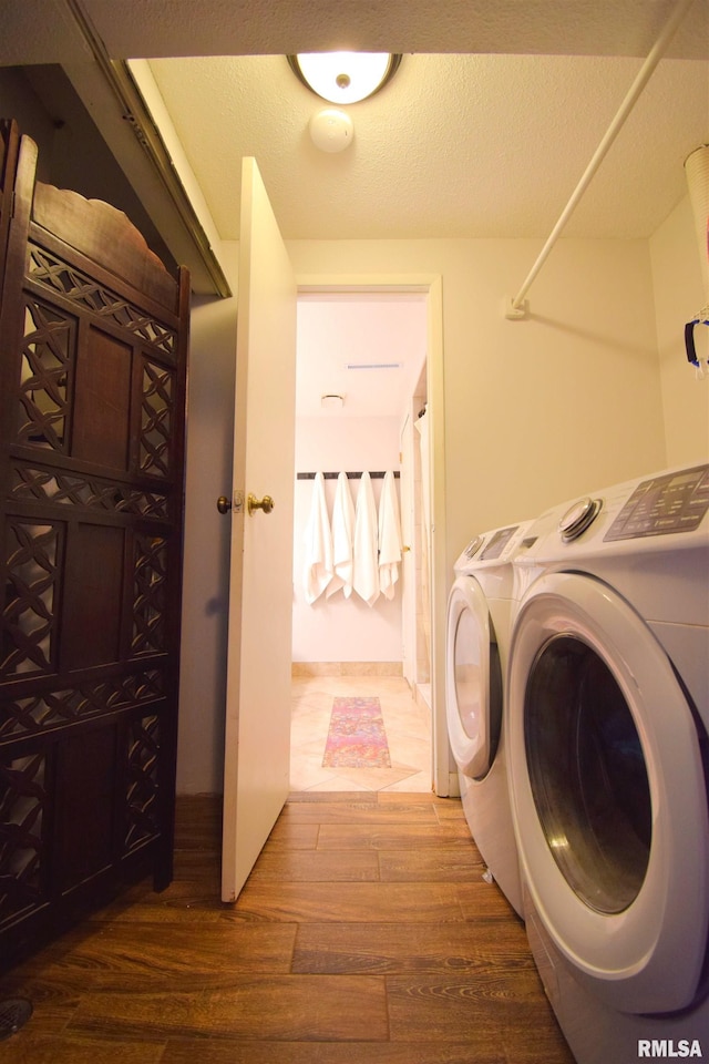 3100 Mulberry Ave, Mount Vernon, IL 62864 - laundry area with washing machine and clothes dryer and wood finished floors