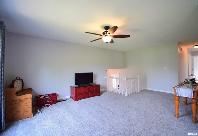 3100 Mulberry Ave, Mount Vernon, IL 62864 - living area featuring ceiling fan, carpet floors, and baseboards