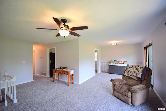 3100 Mulberry Ave, Mount Vernon, IL 62864 - sitting room featuring light colored carpet, ceiling fan, and baseboards