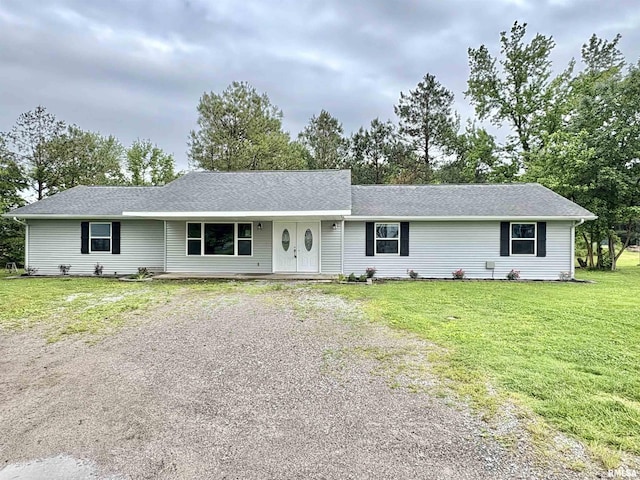 910 Fairlane Dr, Marion, IL 62959 - ranch-style home with gravel driveway and a front lawn