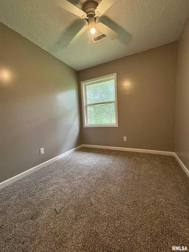 910 Fairlane Dr, Marion, IL 62959 - carpeted empty room featuring a textured ceiling, baseboards, and ceiling fan