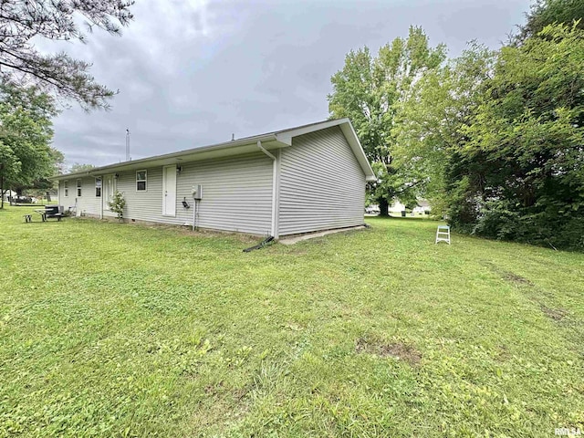 910 Fairlane Dr, Marion, IL 62959 - rear view of property with a lawn