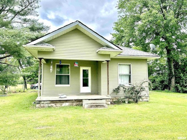1105 N Maple St, Carterville, IL 62918 - rear view of property with a porch, a yard, and a shingled roof