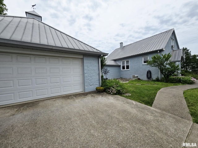 112 W Main St, Mcleansboro, IL 62859 - garage with asphalt driveway