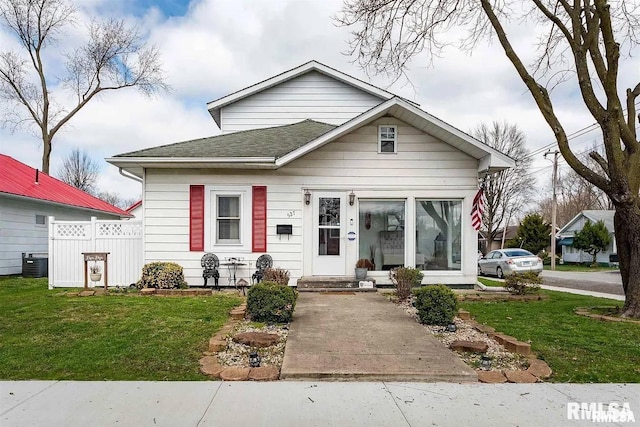 527 E Lawrence St, Benton, IL 62812 - view of front of property featuring a shingled roof and cooling unit
