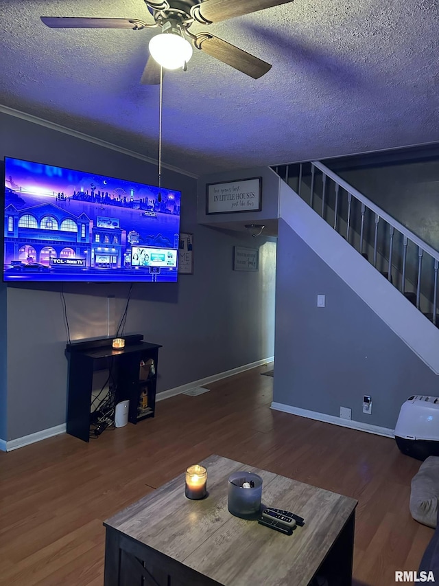 527 E Lawrence St, Benton, IL 62812 - living room with a textured ceiling, wood finished floors, a ceiling fan, stairway, and baseboards