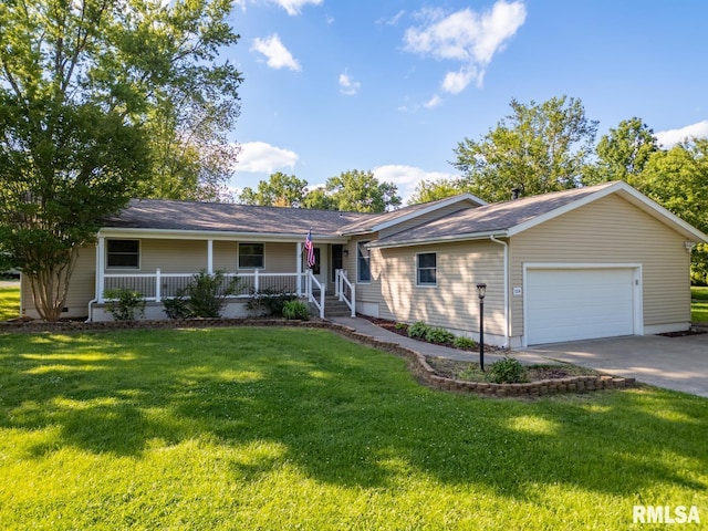 1004 Mockingbird Ln, Carterville, IL 62918 - single story home with a porch, an attached garage, driveway, and a front lawn