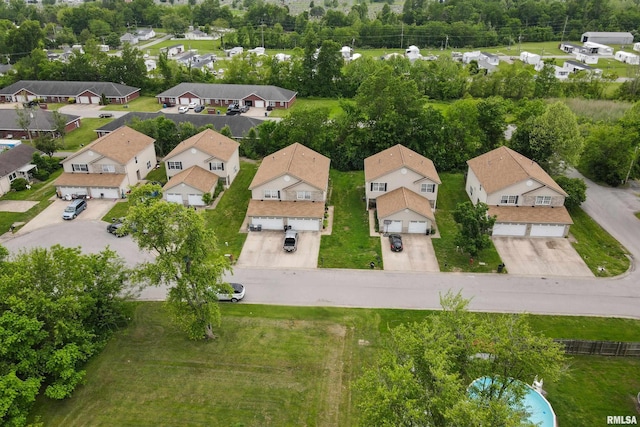1500 Cornerstone Ct, Marion, IL 62959 - aerial view of property's location featuring nearby suburban area and a tree filled landscape
