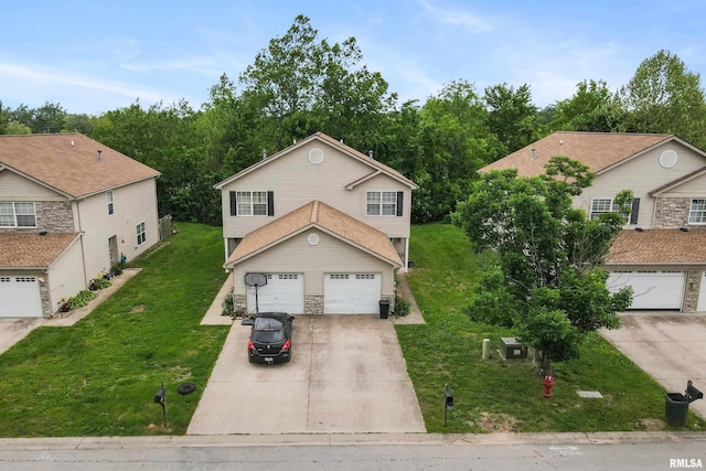 1500 Cornerstone Ct, Marion, IL 62959 - traditional-style house with concrete driveway, a garage, and a front yard