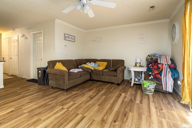 1500 Cornerstone Ct, Marion, IL 62959 - living area with light wood-style floors, ceiling fan, crown molding, and baseboards