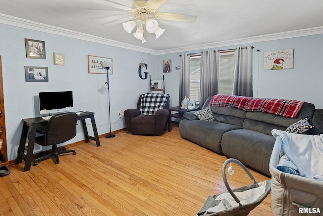 203 E 2nd St, Sparta, IL 62286 - living area with ornamental molding, a ceiling fan, light wood-style floors, baseboards, and a desk