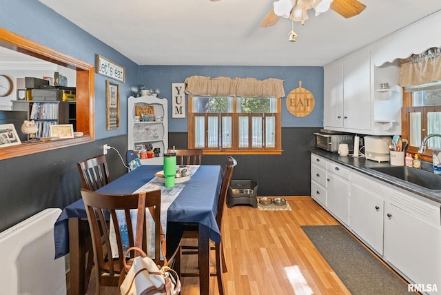 203 E 2nd St, Sparta, IL 62286 - dining area featuring light wood finished floors and a ceiling fan