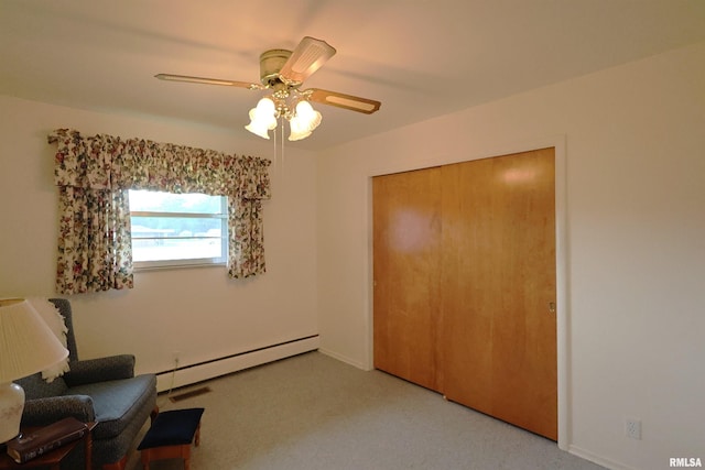 914 Meadow Ln, Salem, IL 62881 - unfurnished room featuring baseboard heating, light carpet, a ceiling fan, and baseboards