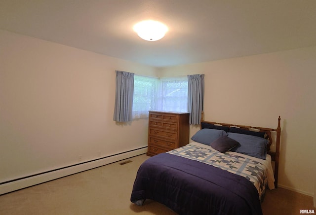 914 Meadow Ln, Salem, IL 62881 - bedroom featuring baseboard heating and carpet floors