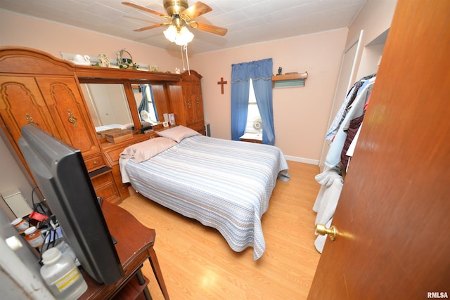 12522 N Dartmouth Ln, Mount Vernon, IL 62864 - bedroom featuring light wood-style flooring and ceiling fan