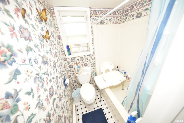 12522 N Dartmouth Ln, Mount Vernon, IL 62864 - bathroom with wallpapered walls and toilet