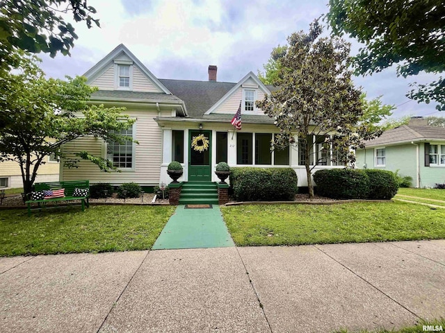 212 E 3rd St, Metropolis, IL 62960 - view of front of property featuring a front yard, a chimney, and roof with shingles