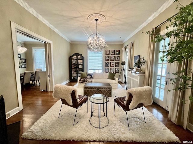212 E 3rd St, Metropolis, IL 62960 - dining room with dark wood-style flooring, a chandelier, healthy amount of natural light, crown molding, and baseboards