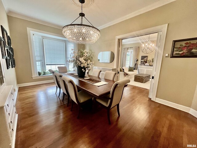 212 E 3rd St, Metropolis, IL 62960 - dining room featuring a chandelier, ornamental molding, wood finished floors, and baseboards