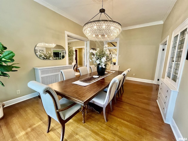 212 E 3rd St, Metropolis, IL 62960 - dining area with a chandelier, wood finished floors, ornamental molding, and baseboards