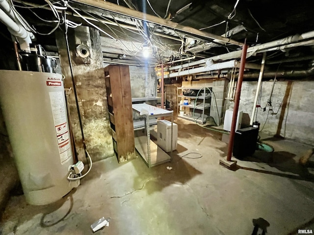 212 E 3rd St, Metropolis, IL 62960 - unfinished basement featuring gas water heater