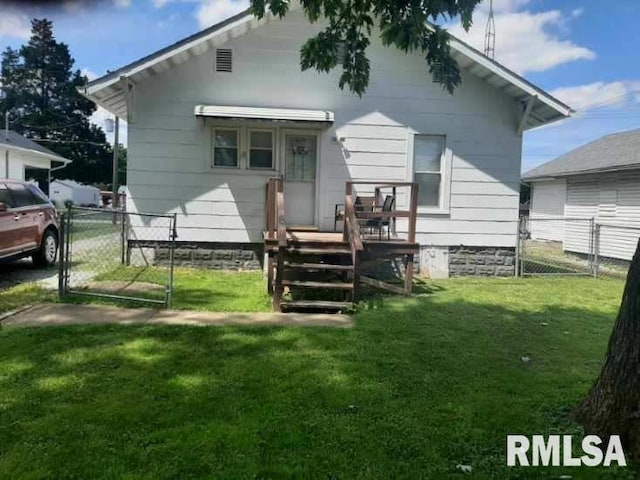 504 W Sylvester Ave, Christopher, IL 62822 - back of property featuring a gate