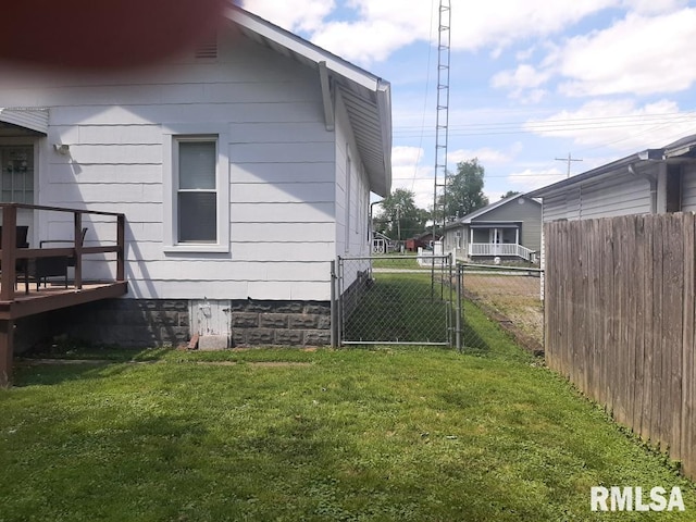 504 W Sylvester Ave, Christopher, IL 62822 - view of side of home featuring a gate