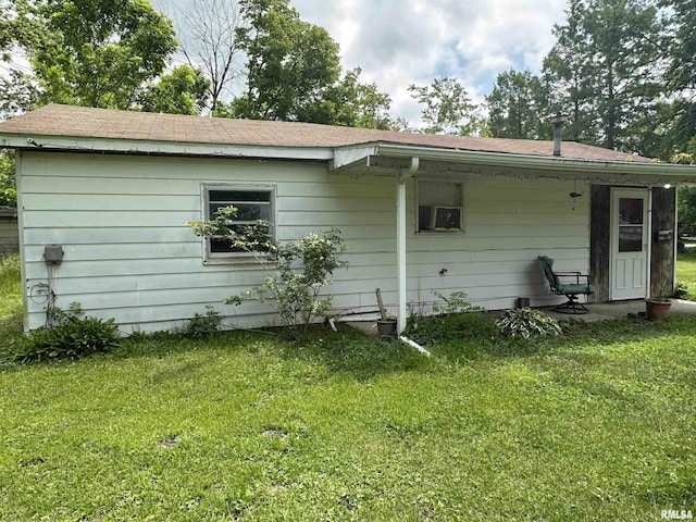 1502 N 13th St, Herrin, IL 62948 - rear view of property with a yard and roof with shingles