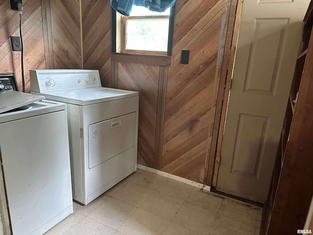 1502 N 13th St, Herrin, IL 62948 - laundry room with separate washer and dryer, wood walls, and baseboards