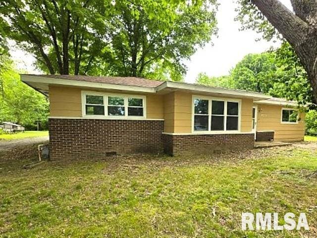 415 Marteeny St, Mount Vernon, IL 62864 - back of property featuring brick siding and a lawn