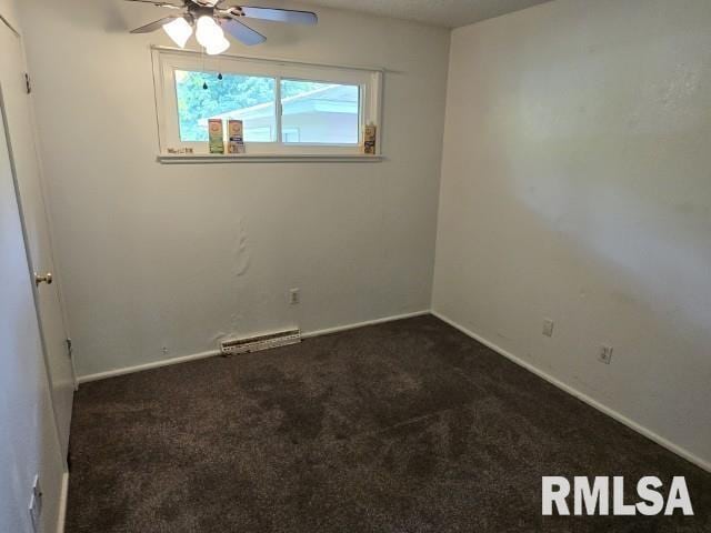 415 Marteeny St, Mount Vernon, IL 62864 - carpeted spare room with a ceiling fan and baseboards