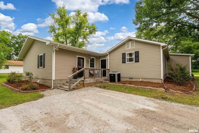 213 Texas Ave, Carterville, IL 62918 - view of front facade with central air condition unit and crawl space