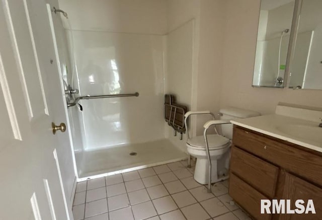210 N State St, Christopher, IL 62822 - full bath with toilet, a shower, tile patterned flooring, and vanity