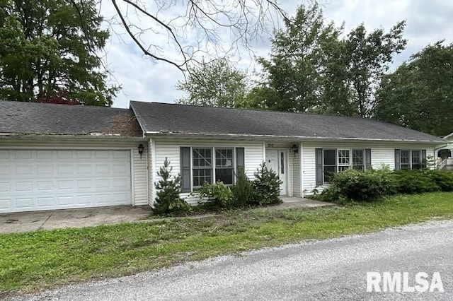 210 N State St, Christopher, IL 62822 - ranch-style house with a garage
