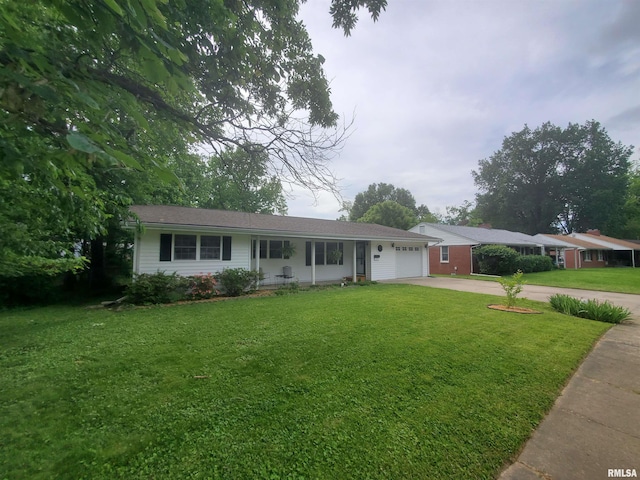 614 S Skyline Dr, Carbondale, IL 62901 - ranch-style home with driveway, an attached garage, and a front lawn