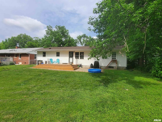 614 S Skyline Dr, Carbondale, IL 62901 - rear view of house featuring a wooden deck and a lawn
