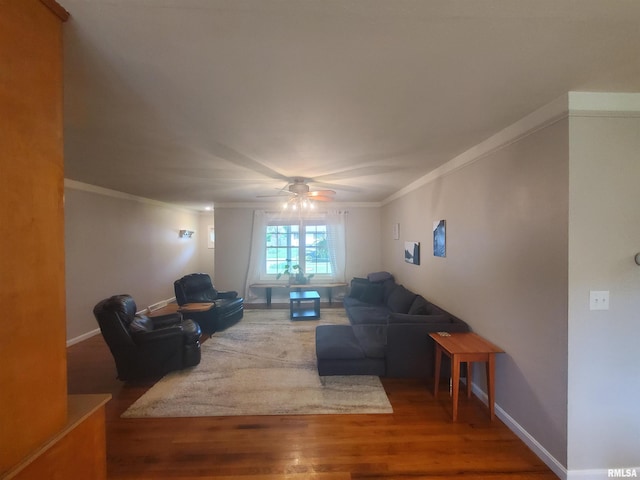 614 S Skyline Dr, Carbondale, IL 62901 - living area with ornamental molding, wood finished floors, ceiling fan, and baseboards