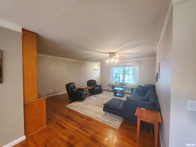 614 S Skyline Dr, Carbondale, IL 62901 - living area with wood finished floors, ornamental molding, a ceiling fan, and baseboards