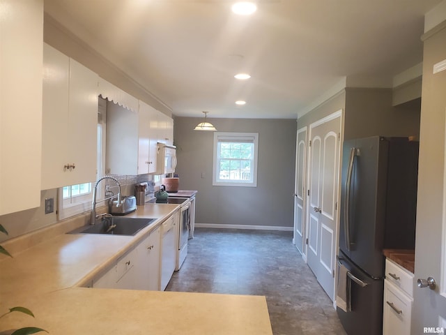 614 S Skyline Dr, Carbondale, IL 62901 - kitchen featuring a sink, white appliances, concrete flooring, white cabinets, and recessed lighting