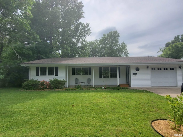 614 S Skyline Dr, Carbondale, IL 62901 - ranch-style home with an attached garage, a front lawn, a porch, and concrete driveway