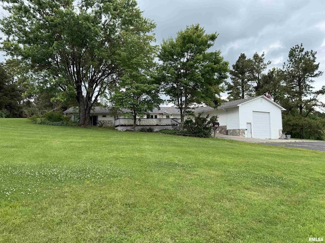 15 Dunn Ln, Goreville, IL 62939 - view of yard with an attached garage and asphalt driveway
