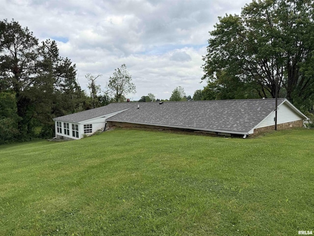 15 Dunn Ln, Goreville, IL 62939 - rear view of house with a lawn and a shingled roof